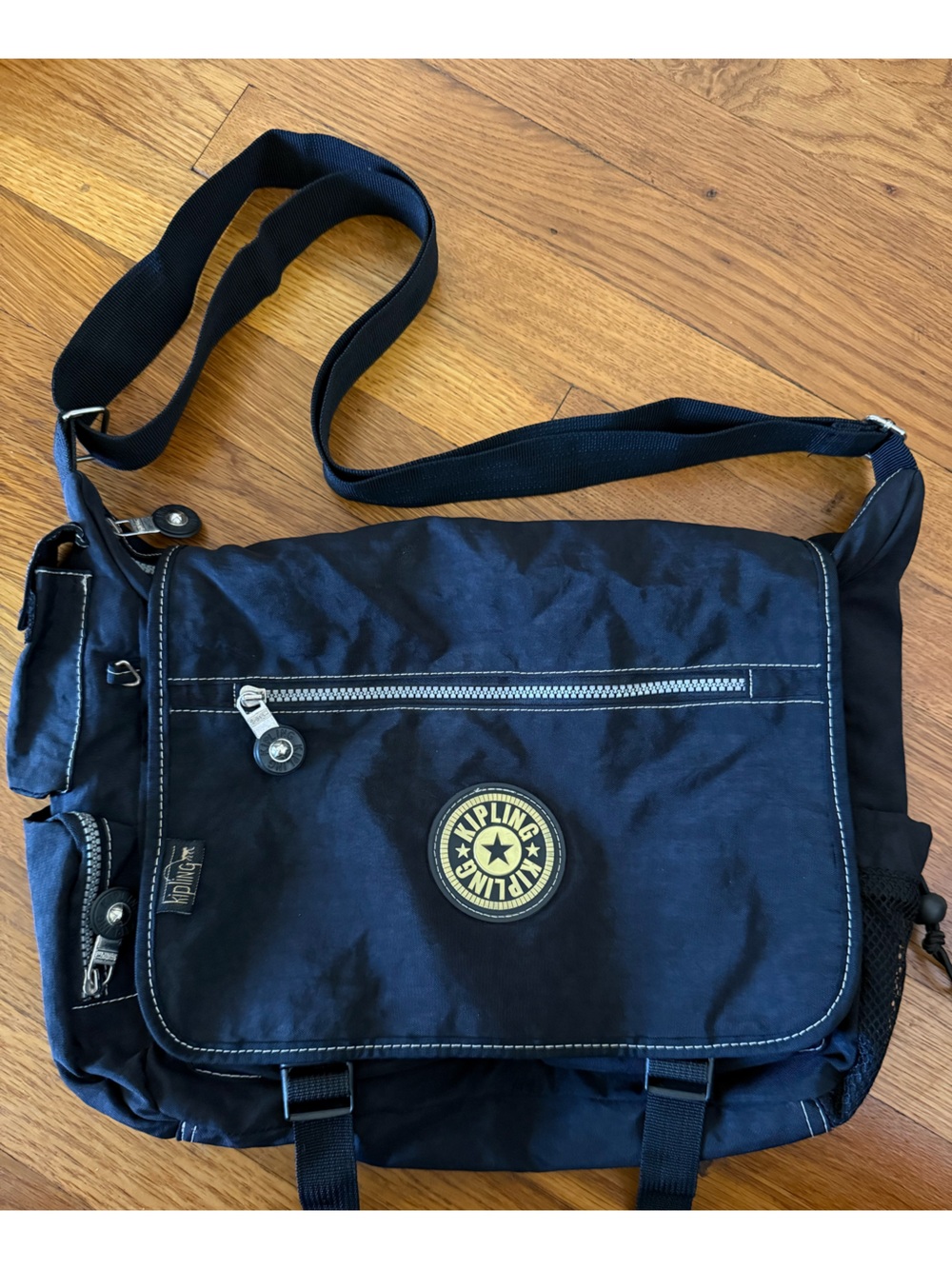 Kipling Black Messenger Bag with Black Strap and Yellow Logo Patch